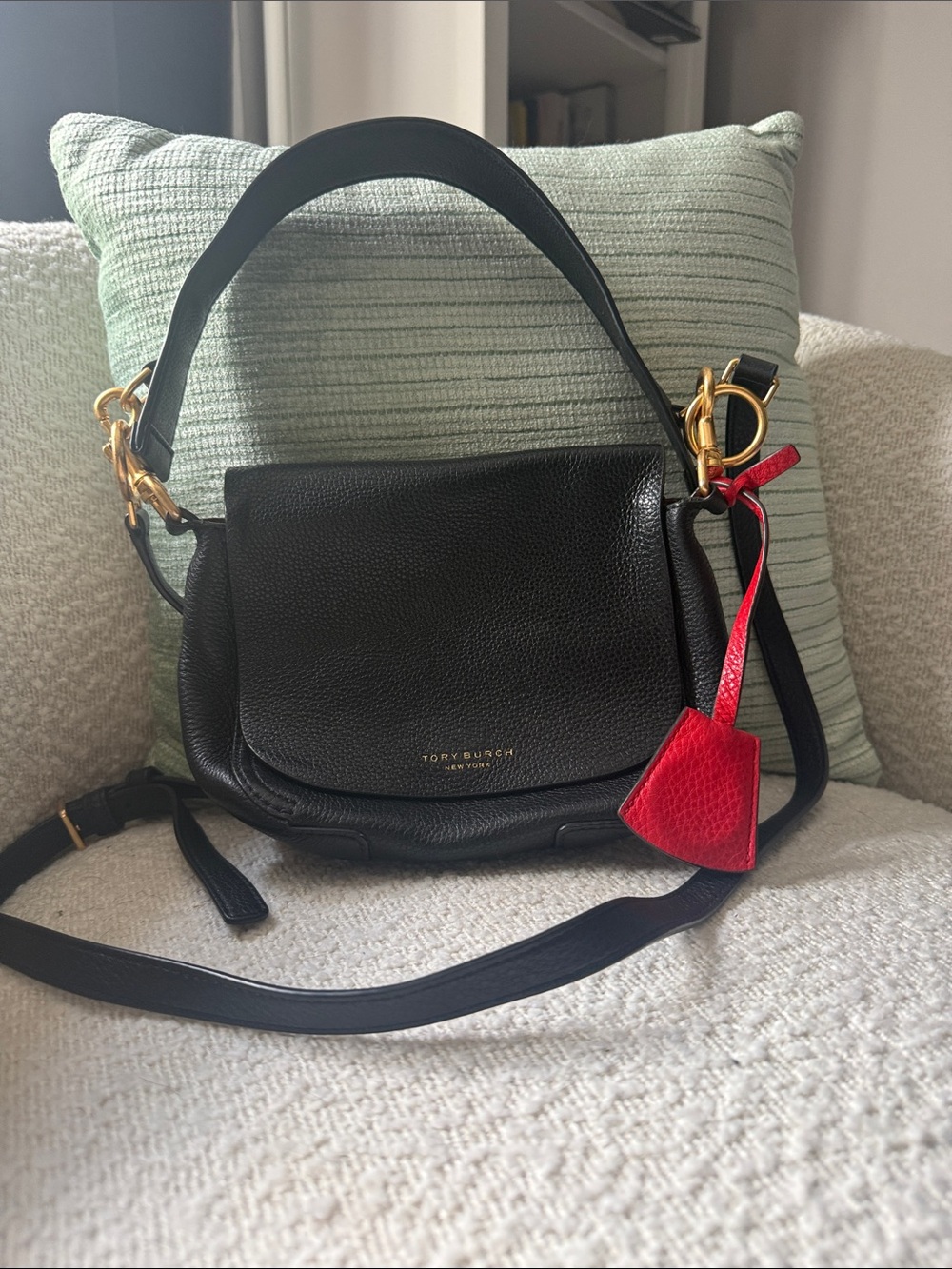 Tory Burch Black Leather Shoulder Bag with Red Charm Accent